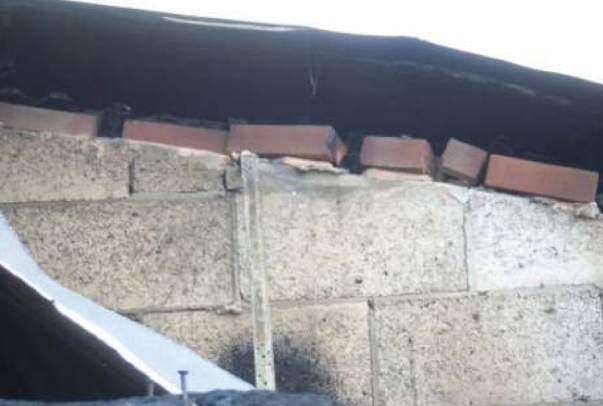 Attempt to provide fire stopping in curved section of wall.jpg