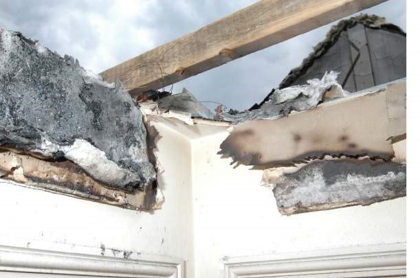 Mineral wool fire stopping along pitch of roof.jpg