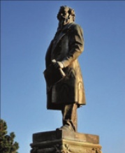 Bronze statue of Sir Titus Salt in Roberts Park.jpg