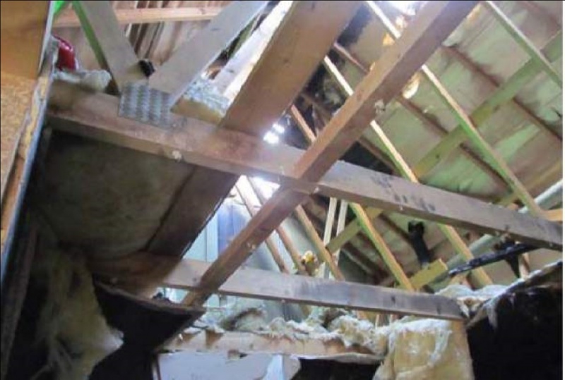 File:Undamaged roof trusses above seat of fire.jpg