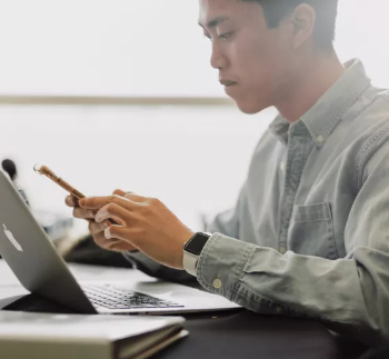 CIOB man at desk 350.jpg