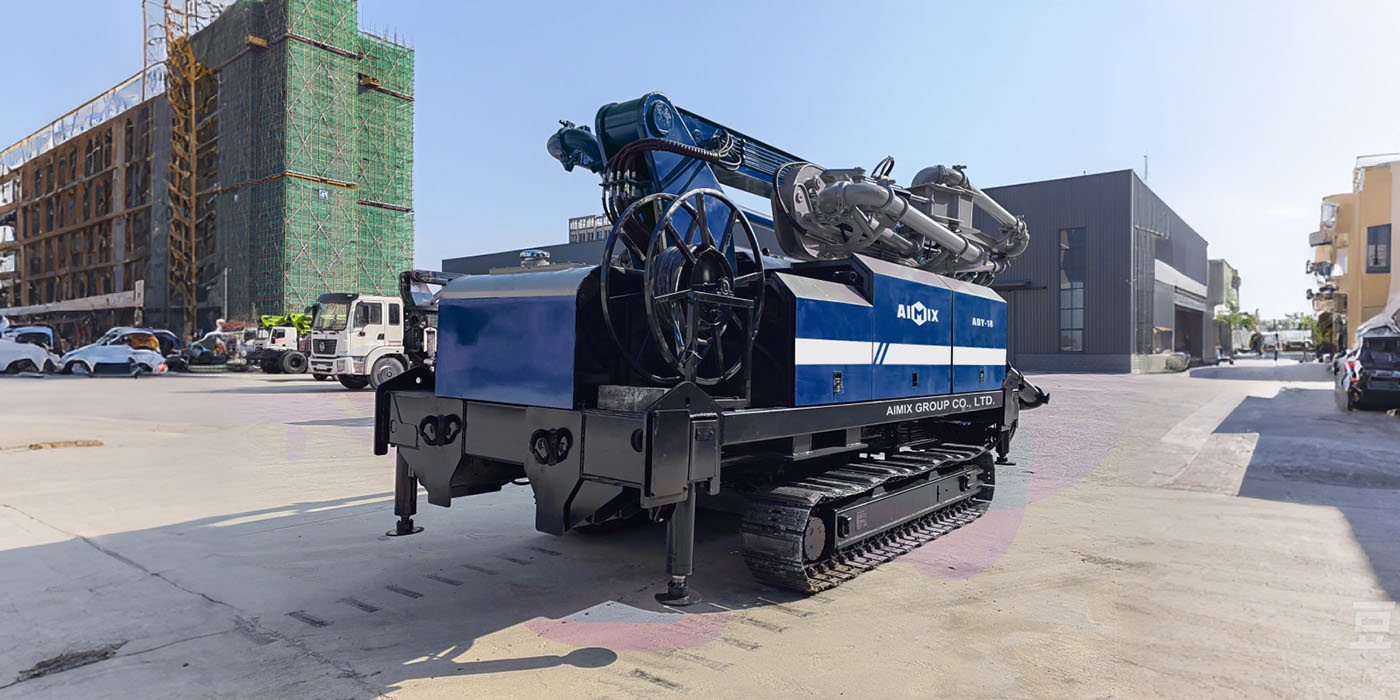 Crawler type concrete pump long boom with pan mixer on site.jpg