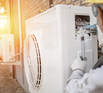File:City electric heat pump Installer image 01 - for press 350.jpg