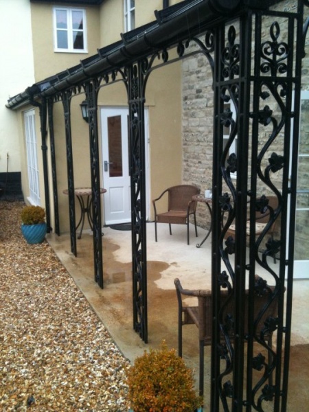 File:Wrought iron porch.jpg