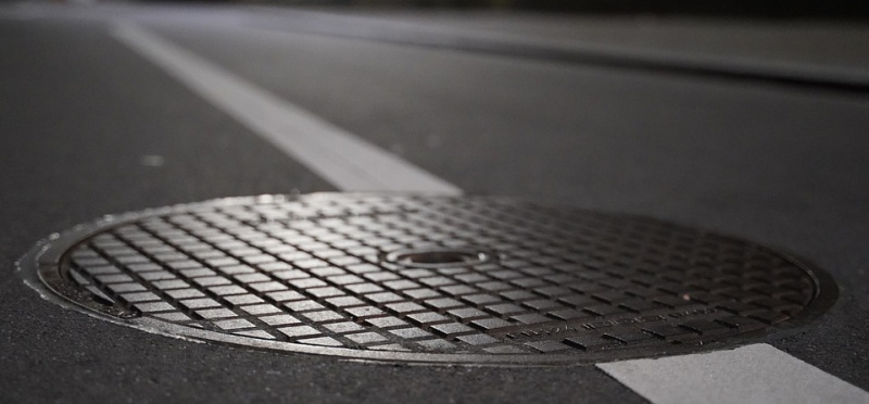 File:Manhole cover road .jpg