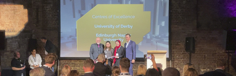 File:AT23 uni derby banner .jpg